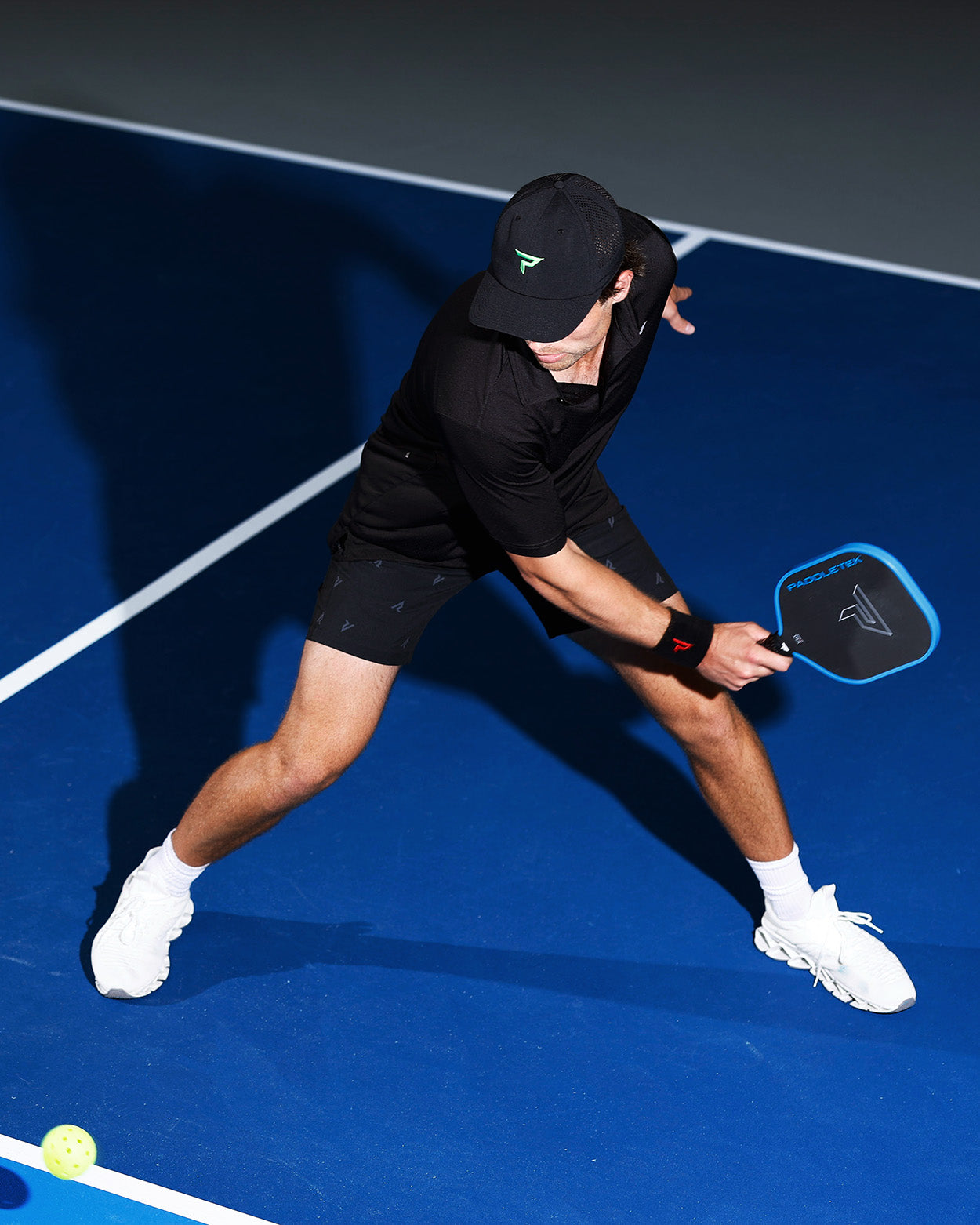 Person playing pickleball